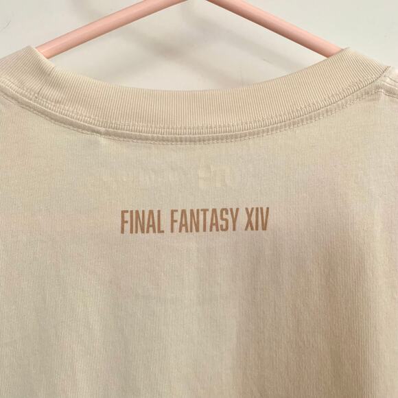 Uniqlo Final Fantasy 14 FFXIV Chocobo Moogle Fat Cat Pocket T-shirt in Natural - Picture 9 of 12